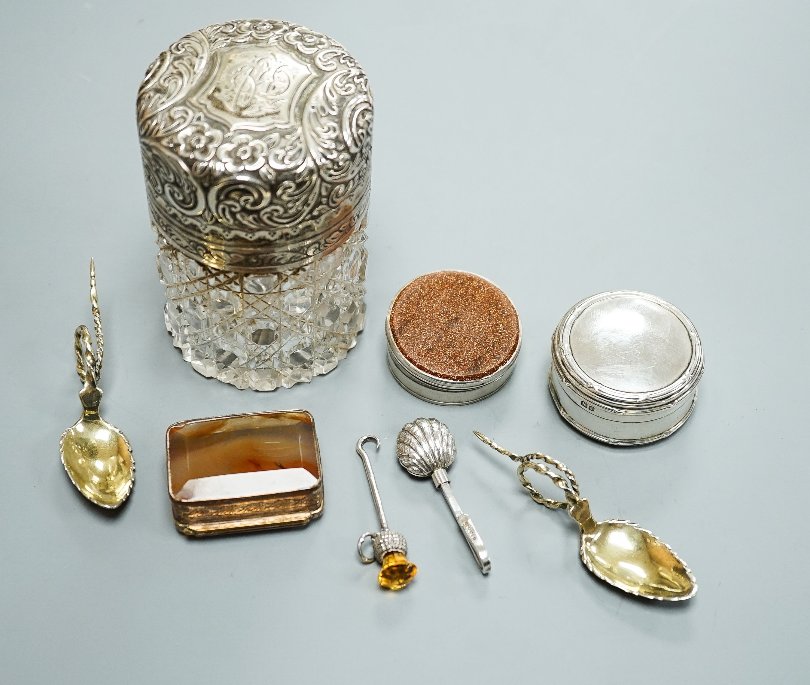 A mid 18th century counter box (adapted?), 4cm, a George V silver pill box, a banded agate set copper snuff box, two small gilt white metal spoons stamped '131/2', a George V silver button hook with thistle terminal and